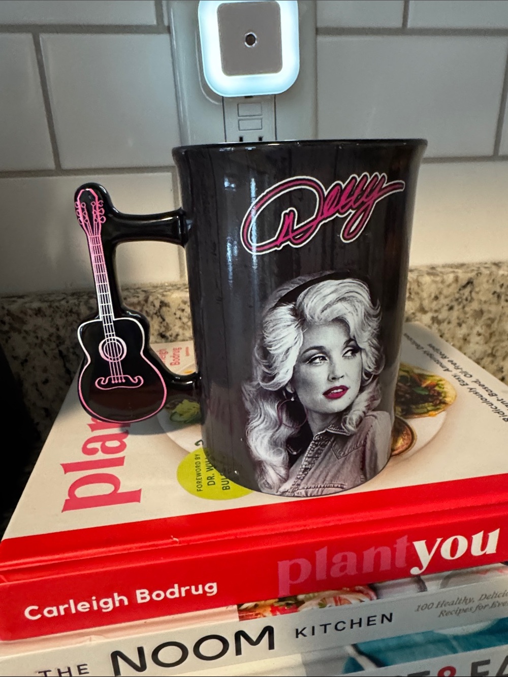 DOLLY FROM DOLLYWOOD Black Ceramic Mug with Pink-Accent Guitar Handle